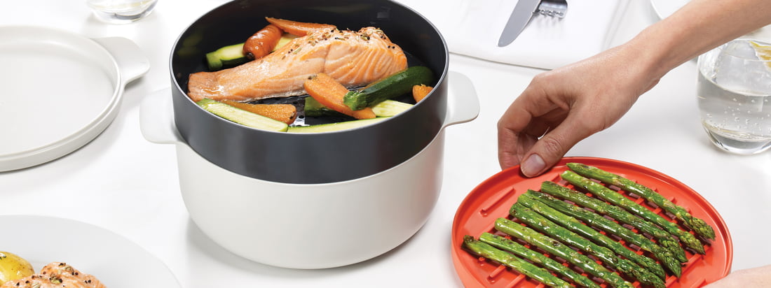 The M-Cuisine Collection by Joseph Joseph includes a pasta and rice cooker, an egg poacher, cool-touch bowl and plate, an omelette bowl and a 4-piece cooking set.
