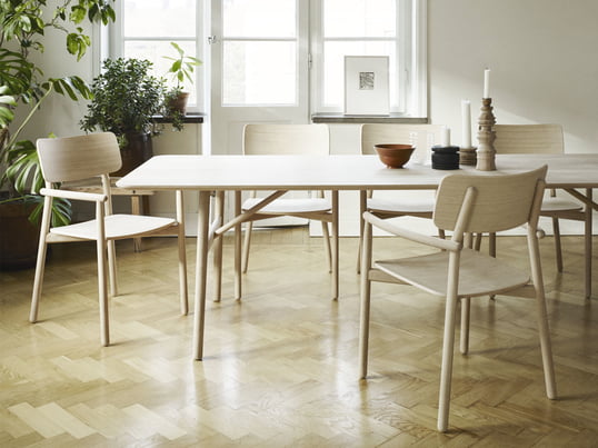 The Hven dining table 94 × 260 cm with the Hven armchair from Skagerak in the ambience view. The collection is by the Swedish designer Anton Björsing.