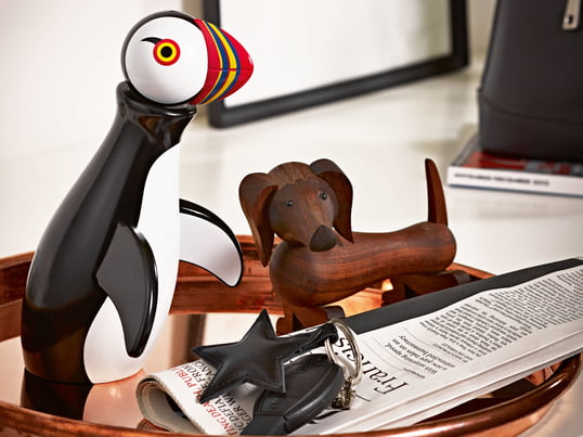 The Puffin as well as the wooden dog from the animal collection by the Danish functionalist Kay Bojesen are decorative design objects made of high-quality oiled or painted wood.