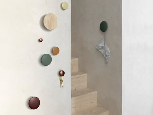 The wall hooks "The Dots" by Muuto in the ambience view: The wall hooks guarantee safe and stylish hold for clothes, bags and accessories in the hallway.