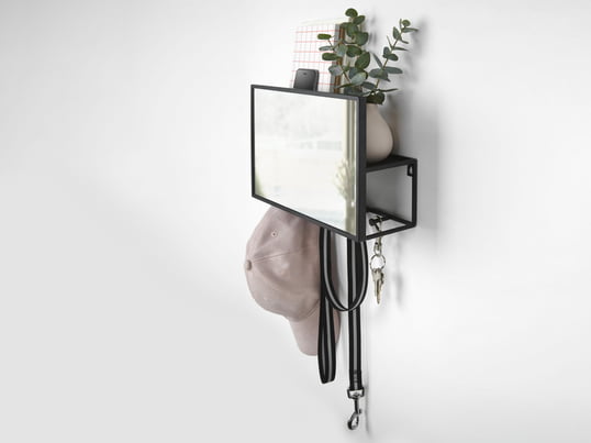 The Cubiko organizer with mirror by Umbra in the ambience view: The shelf stores everyday items stylishly and discreetly behind a mirror in the hallway.