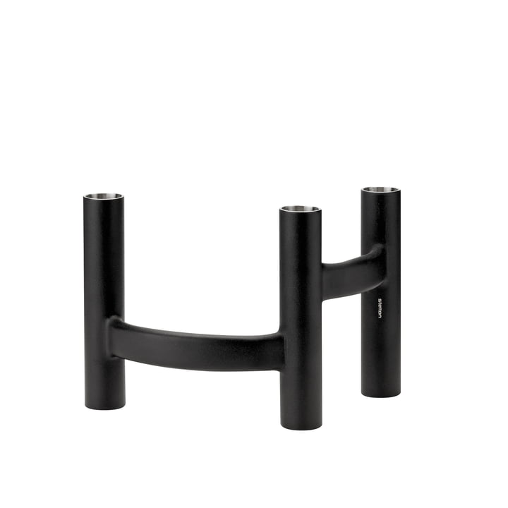 The candlestick three-armed, black from Stelton