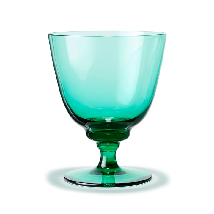 Flow Drinking glass with base with Holmegaard in the color green