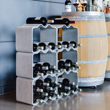 Many Cheers wine racks from Eternit stacked on top of each other in the wine cellar