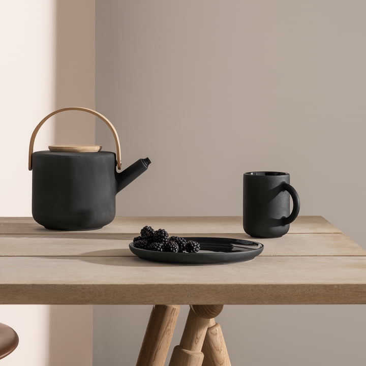 The Stelton - Theo Cups and Teapot on the Table