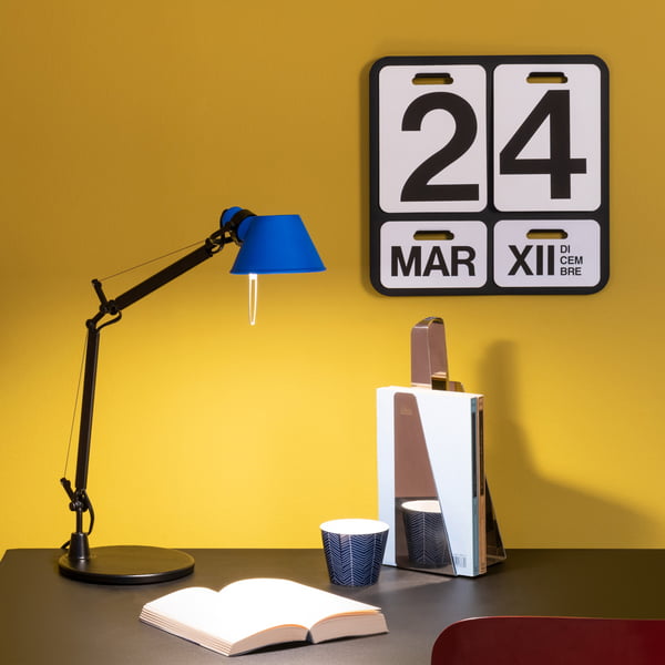 Tolomeo Micro Bicolor table lamp by Artemide on the desk
