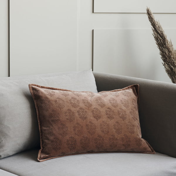 The Velv cushion cover in the midst of subtle interiors