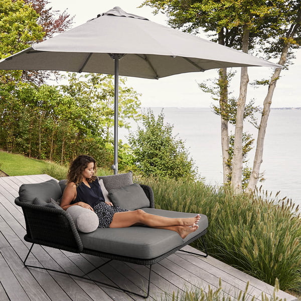 The spacious Horizon Daybed Outdoor from Cane-line has room for the whole family