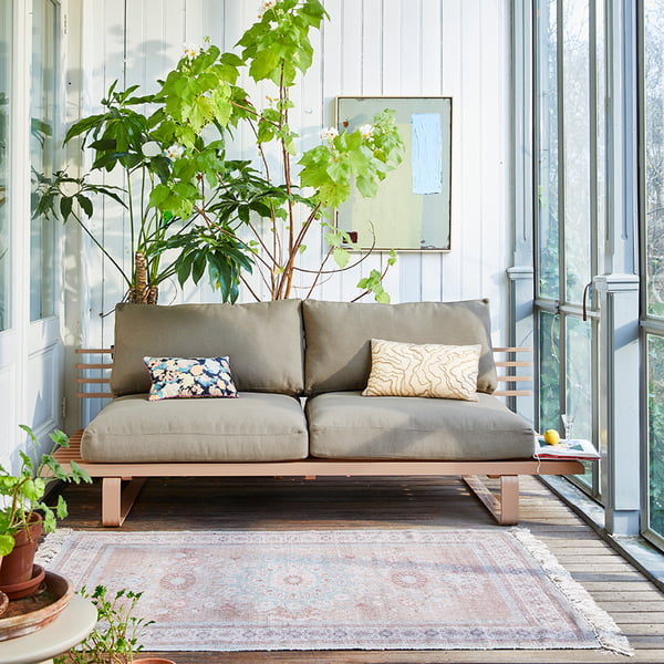 The weatherproof aluminium Outdoor Lounge sofa from HKliving in the bright living room